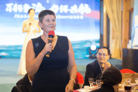 picture of Kathryn Read speaking at an event in China